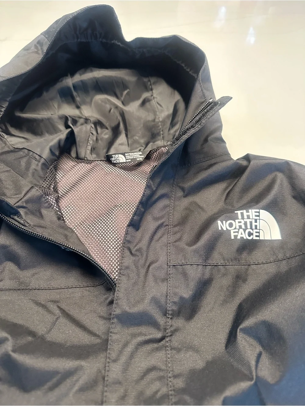 The North Face Kids Black Hooded Rain Jacket with Dry Vent